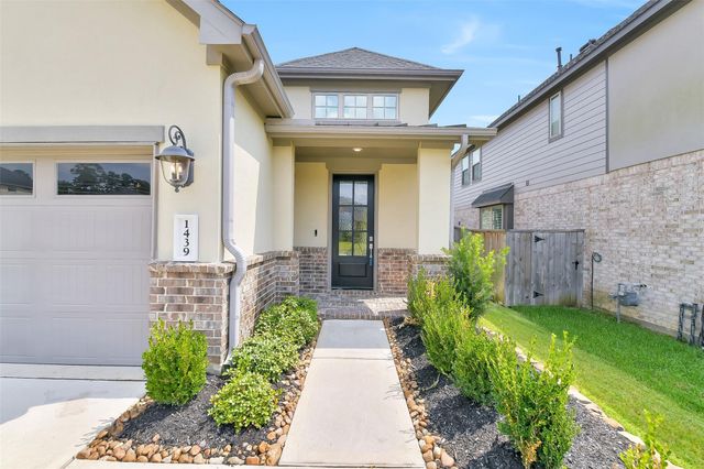 1439 Northwood Bluff Lane, Pinehurst, TX 77362
