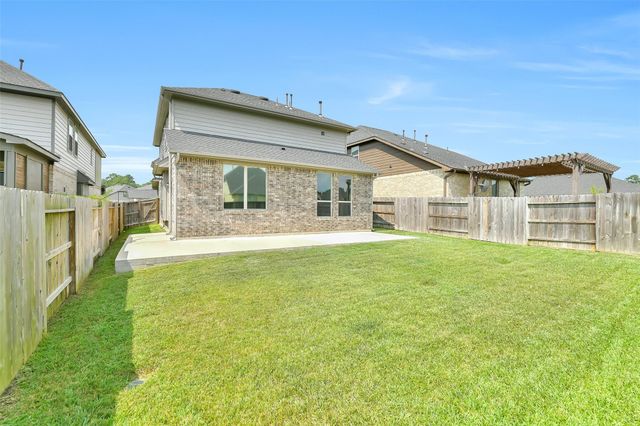 1439 Northwood Bluff Lane, Pinehurst, TX 77362