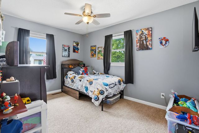 318 E PARKWAY Drive, Blue Grass, IA 52726