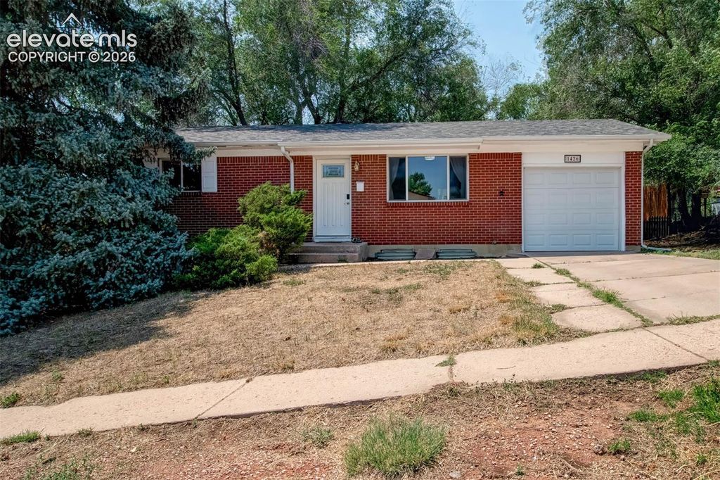 1426 Holmes Drive, Colorado Springs, CO 80909 — exterior