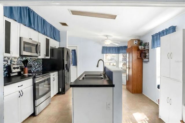 40212 GRAYS AIRPORT ROAD, Lady Lake, FL 32159