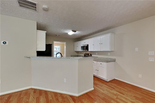 7435 Calm Springs Drive, Flowery Branch, GA 30542