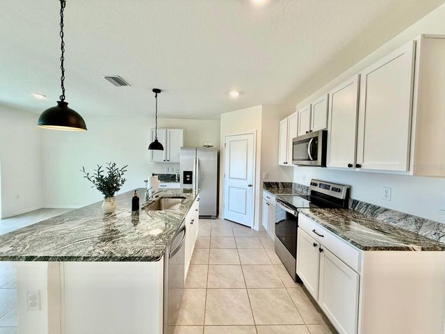 9098 FORGE BREEZE LOOP, Wesley Chapel, FL 33545