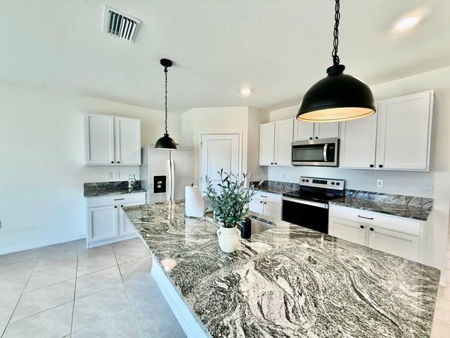 9098 FORGE BREEZE LOOP, Wesley Chapel, FL 33545