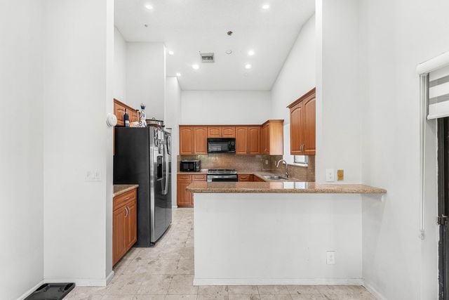 7587 Solimar Circle, Boca Raton, FL 33433