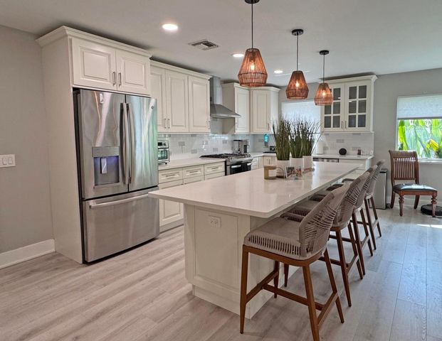 106 Periwinkle Drive, Hypoluxo, FL 33462