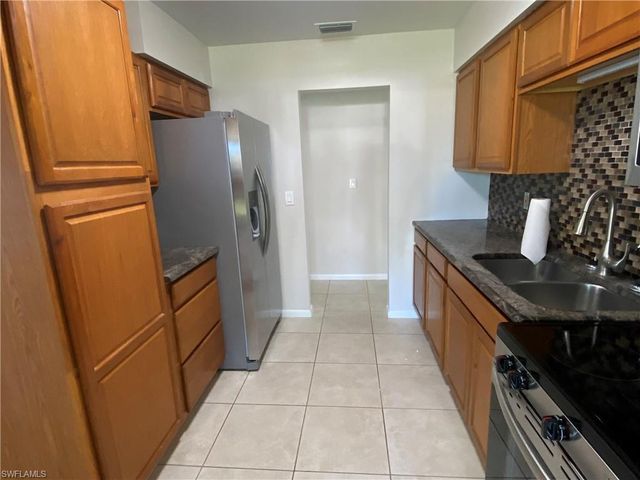 12 Desert Candle CIR, Lehigh Acres, FL 33936