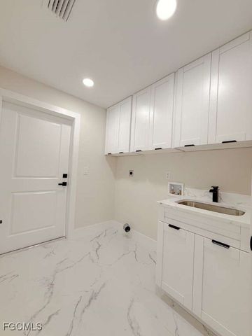 2610 27th ST SW, Lehigh Acres, FL 33976