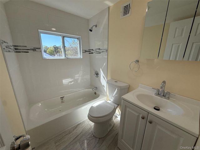 60 Meadowbrook Drive, Brentwood, NY 11717