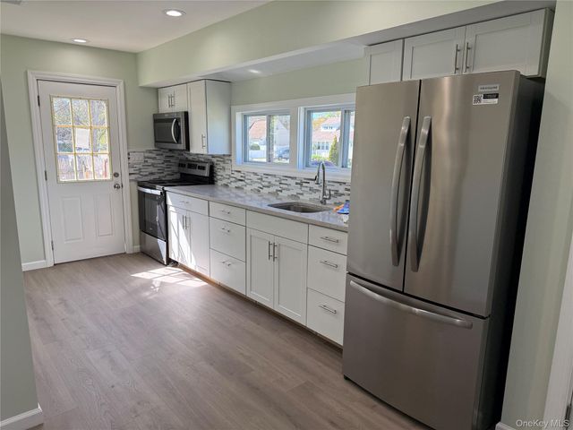 60 Meadowbrook Drive, Brentwood, NY 11717