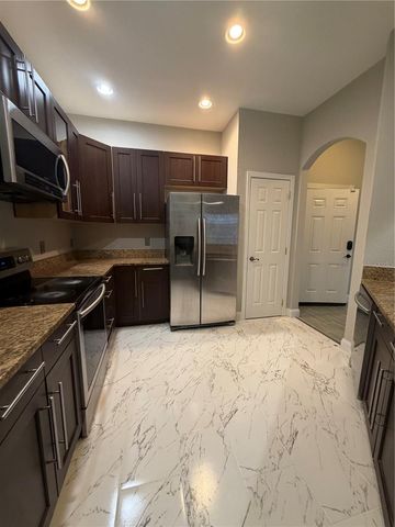 3001 LAUREL RUN LANE 104, Kissimmee, FL 34741
