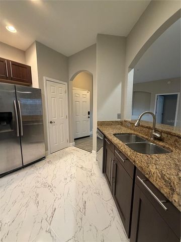3001 LAUREL RUN LANE 104, Kissimmee, FL 34741