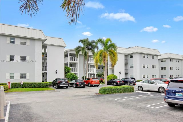 7 Colonial Club Drive 302, Boynton Beach, FL 33435