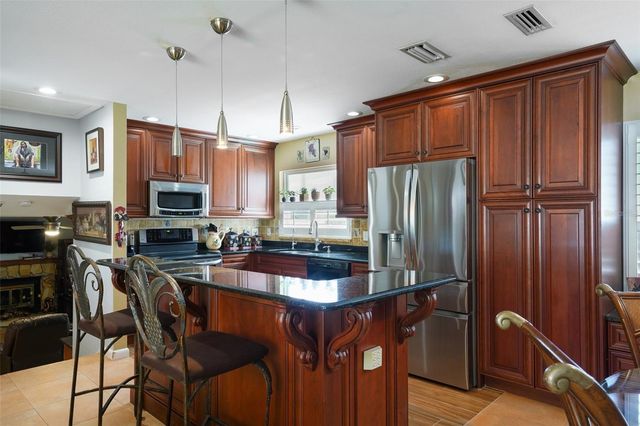 13476 BINGLEWOOD AVENUE, Seminole, FL 33776