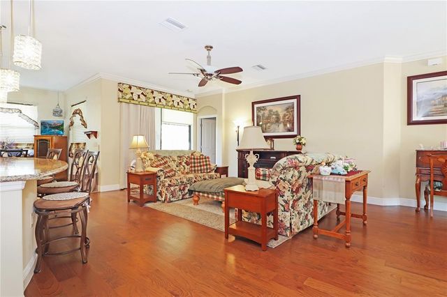 6104 HUNTERS RIDGE AVENUE, Leesburg, FL 34748