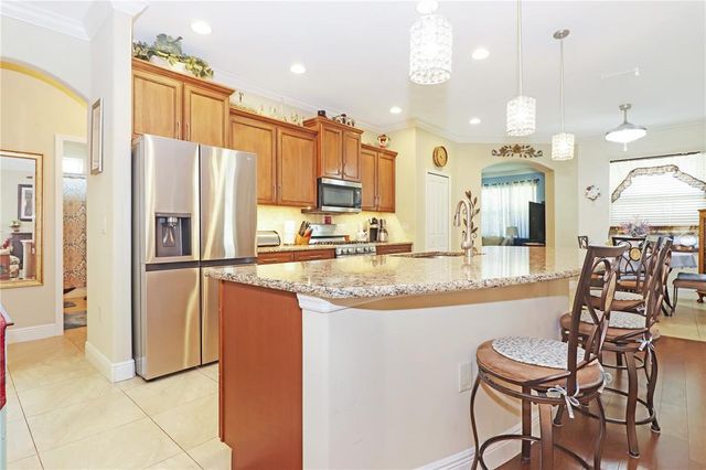 6104 HUNTERS RIDGE AVENUE, Leesburg, FL 34748