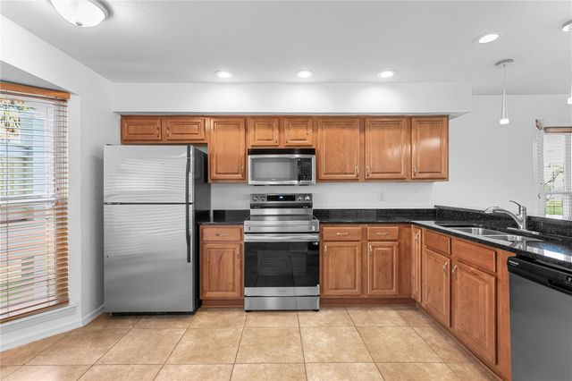 10399 PARADISE BOULEVARD 106B, Treasure Island, FL 33706