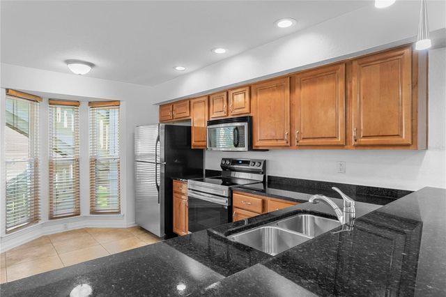 10399 PARADISE BOULEVARD 106B, Treasure Island, FL 33706