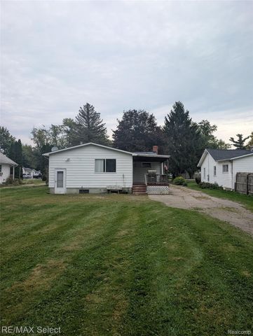 1056 Adams Road, Burton, MI 48509