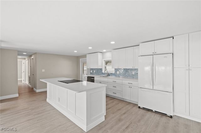 57 San Remo CIR, Naples, FL 34112