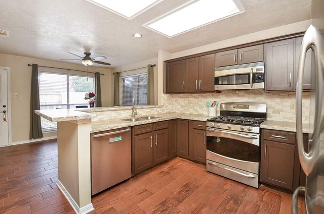 15911 Surrey Woods Drive, Friendswood, TX 77546