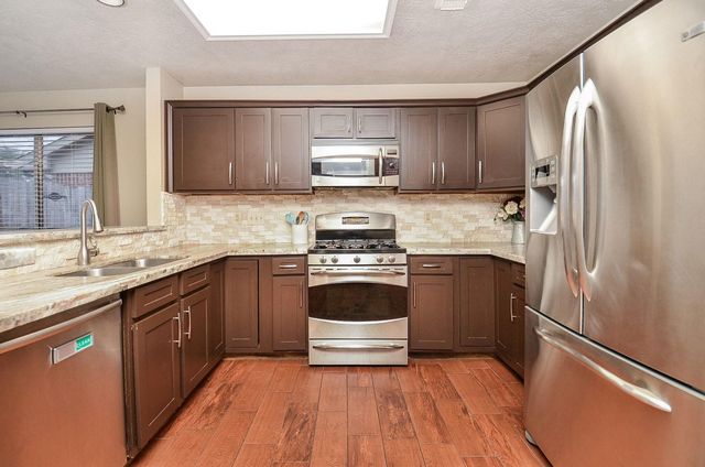 15911 Surrey Woods Drive, Friendswood, TX 77546