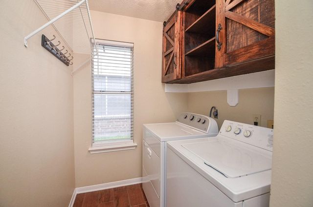 15911 Surrey Woods Drive, Friendswood, TX 77546