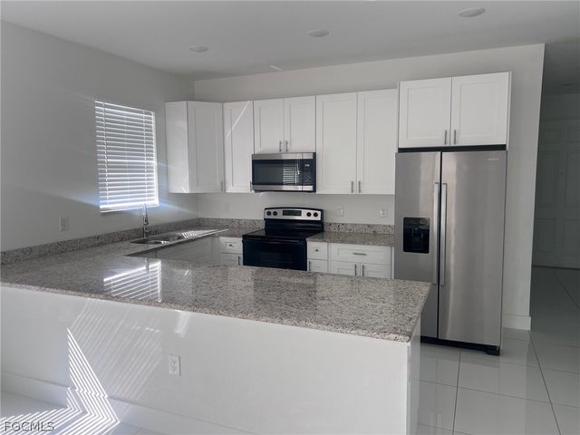 970 Lakeside DR, Lehigh Acres, FL 33974