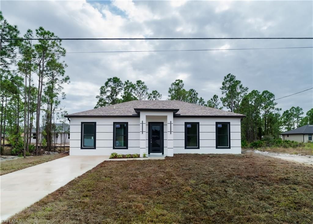 742 Jaguar BLVD, LEHIGH ACRES, FL 33974 — exterior