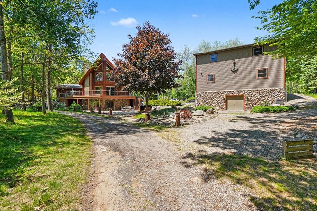 2000 Granada Court, Weidman, MI 48893