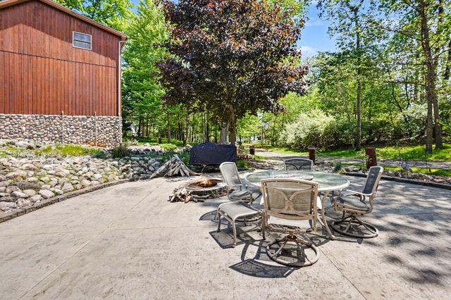 2000 Granada Court, Weidman, MI 48893