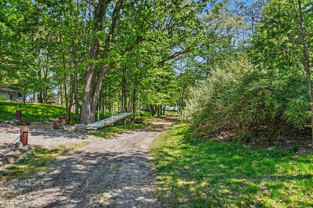 2000 Granada Court, Weidman, MI 48893