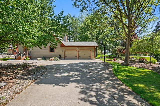 2000 Granada Court, Weidman, MI 48893