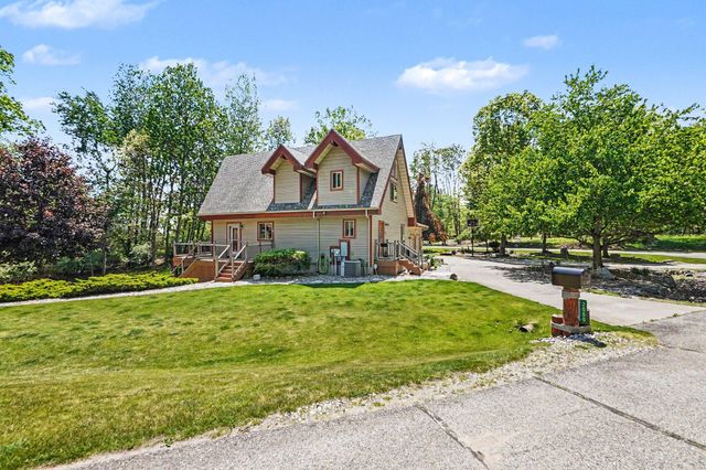 2000 Granada Court, Weidman, MI 48893