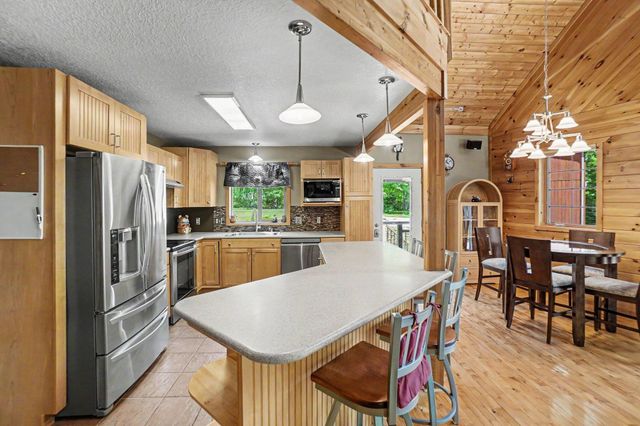2000 Granada Court, Weidman, MI 48893