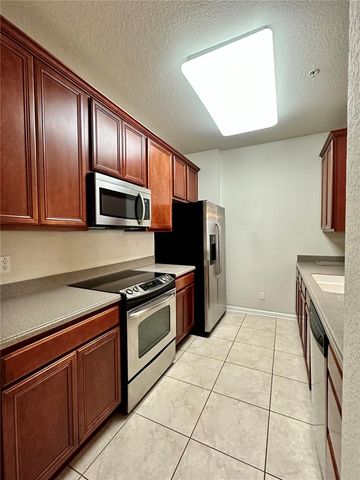 3338 ROBERT TRENT JONES DRIVE 210, Orlando, FL 32835