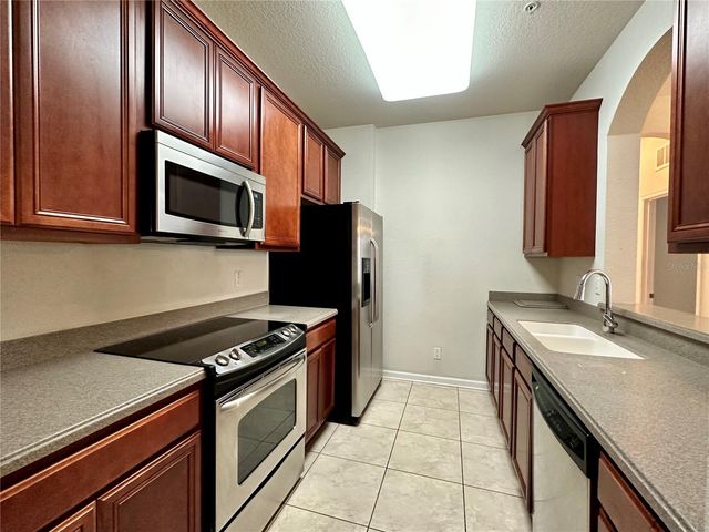 3338 ROBERT TRENT JONES DRIVE 210, Orlando, FL 32835