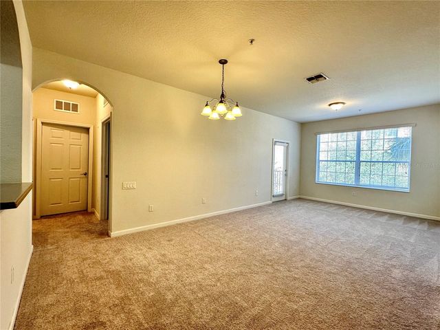 3338 ROBERT TRENT JONES DRIVE 210, Orlando, FL 32835