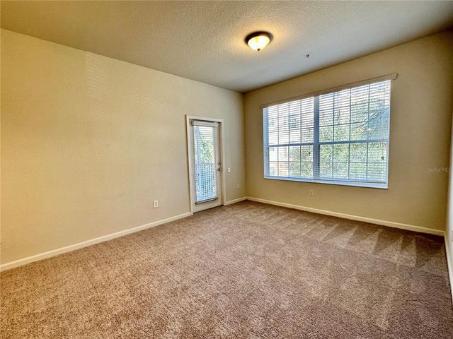 3338 ROBERT TRENT JONES DRIVE 210, Orlando, FL 32835