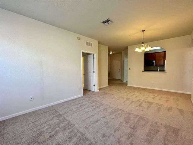 3338 ROBERT TRENT JONES DRIVE 210, Orlando, FL 32835