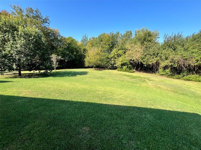 12121 N Ridgeway Drive N, Willis, TX 77318