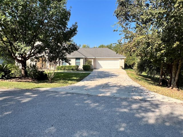 12121 N Ridgeway Drive N, Willis, TX 77318