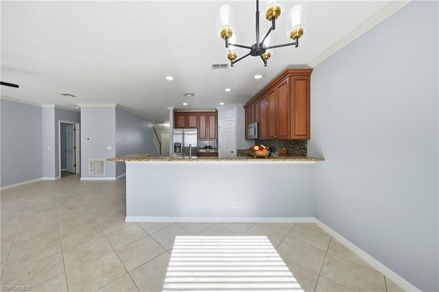 15078 Topsail CT, Naples, FL 34119