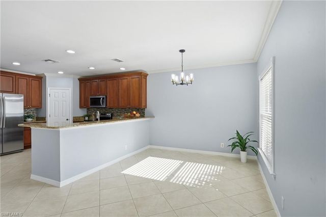 15078 Topsail CT, Naples, FL 34119