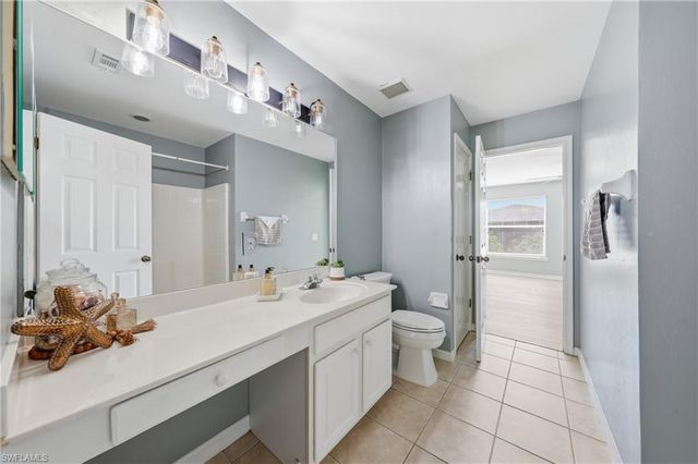 15078 Topsail CT, Naples, FL 34119