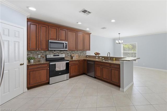 15078 Topsail CT, Naples, FL 34119