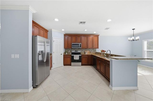 15078 Topsail CT, Naples, FL 34119