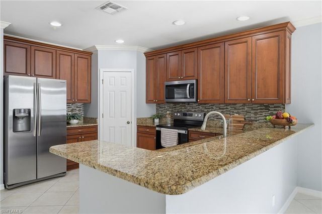 15078 Topsail CT, Naples, FL 34119