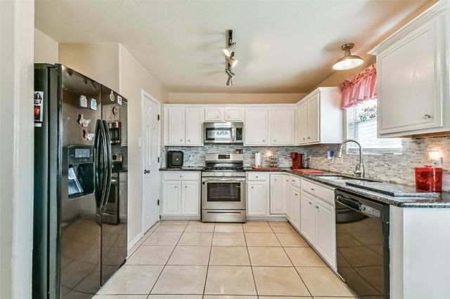 8319 White Pine Lane, Baytown, TX 77523