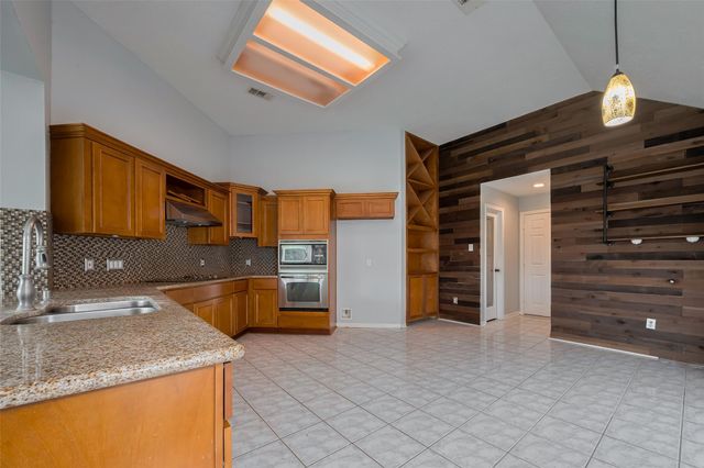 311 N Esplanade Lane, Stafford, TX 77477
